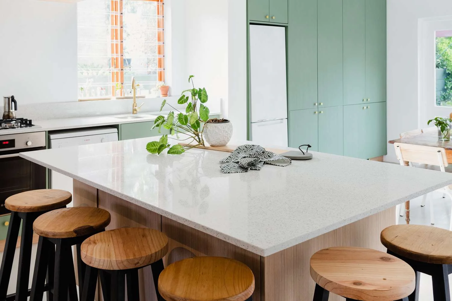 Kitchen Countertop Singapore 2026: How To Pick A Table Top You Won'T Regret White Quartz Kitchen Countertop On An Island With Wooden Bar Stools
